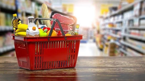 Red basket full of groceries