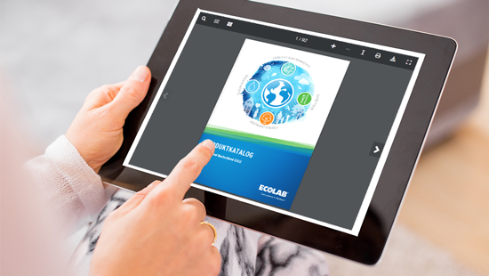 Woman browsing through the Ecolab Institutional Germany product catalogue