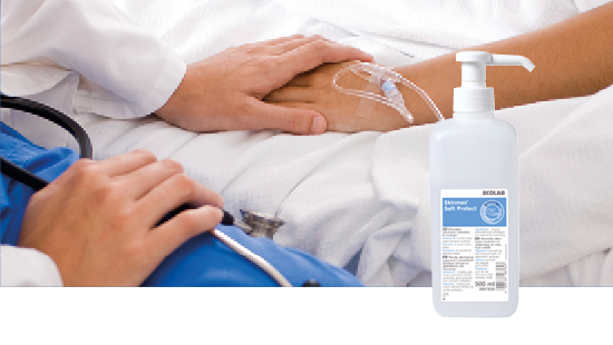 Close-up of a healthcare professional's hands—one on a patient's IV-inserted hand, the other holding a stethoscope—with Ecolab Skinman Soft Protect hand sanitizer in the foreground.